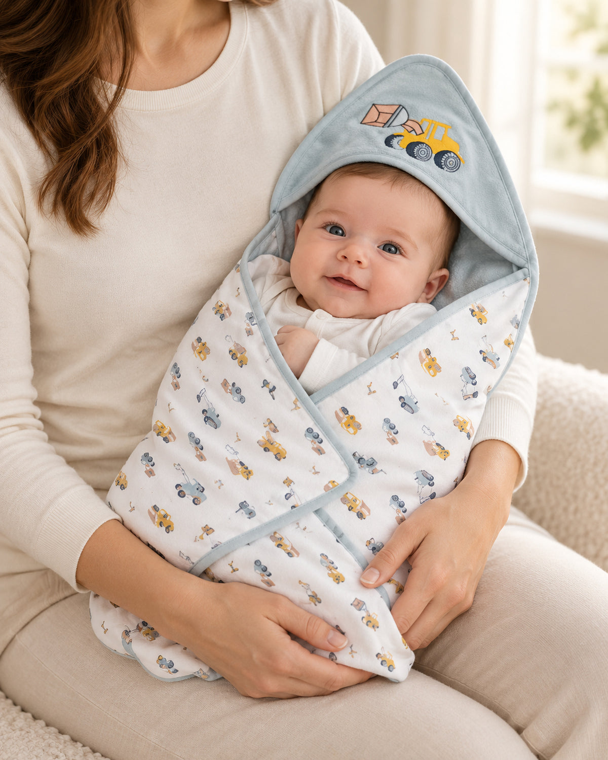 Funny Bunny light blue hooded baby wrap, supported baby model