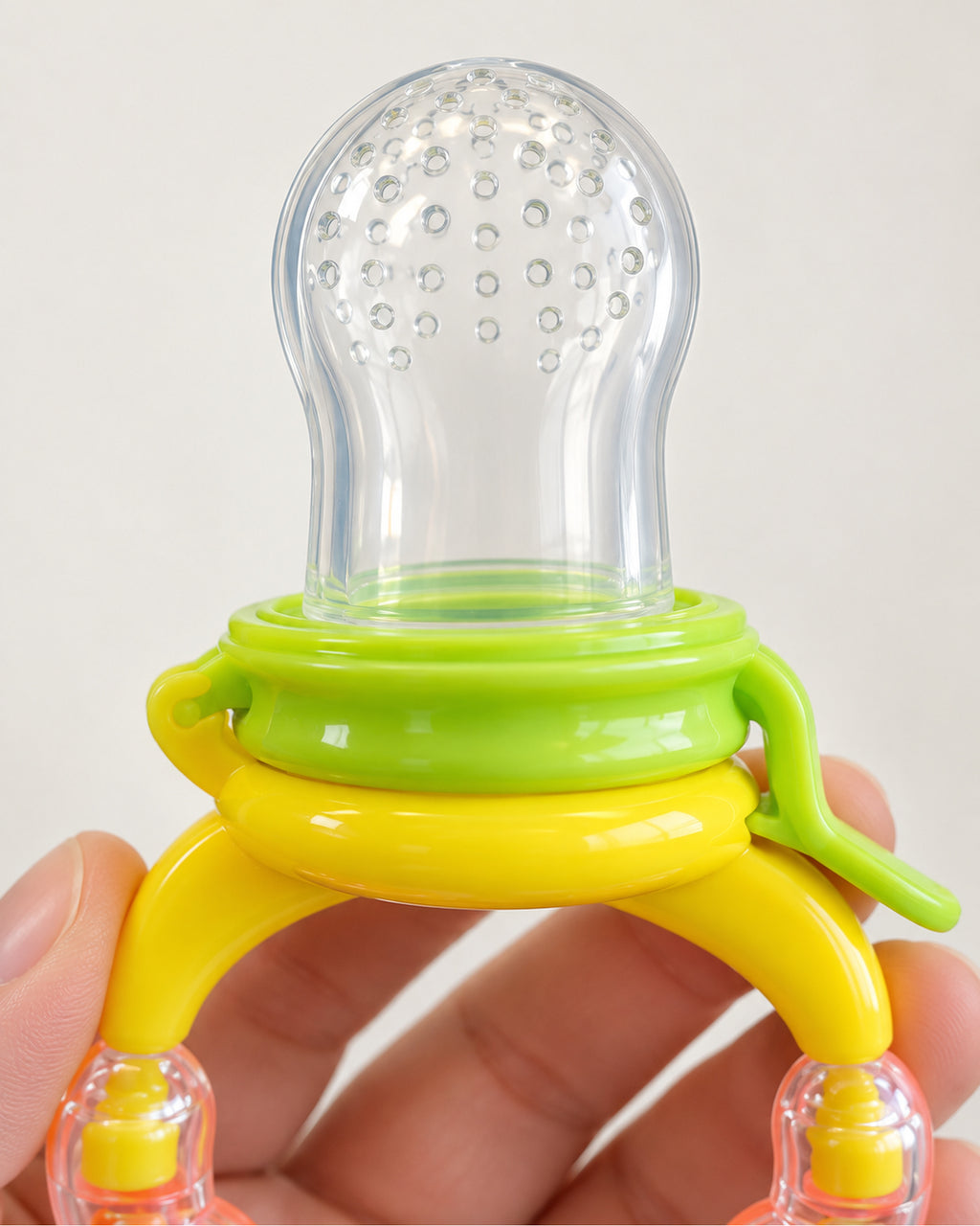 Baby fruit feeder teether, empty perforated feeding bulb detail