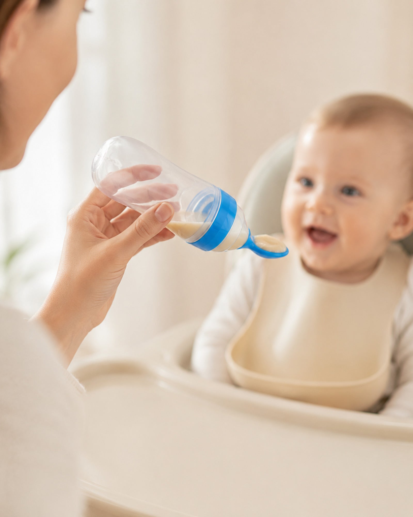 Baby feeding bottle with spoon — supervised meal usage