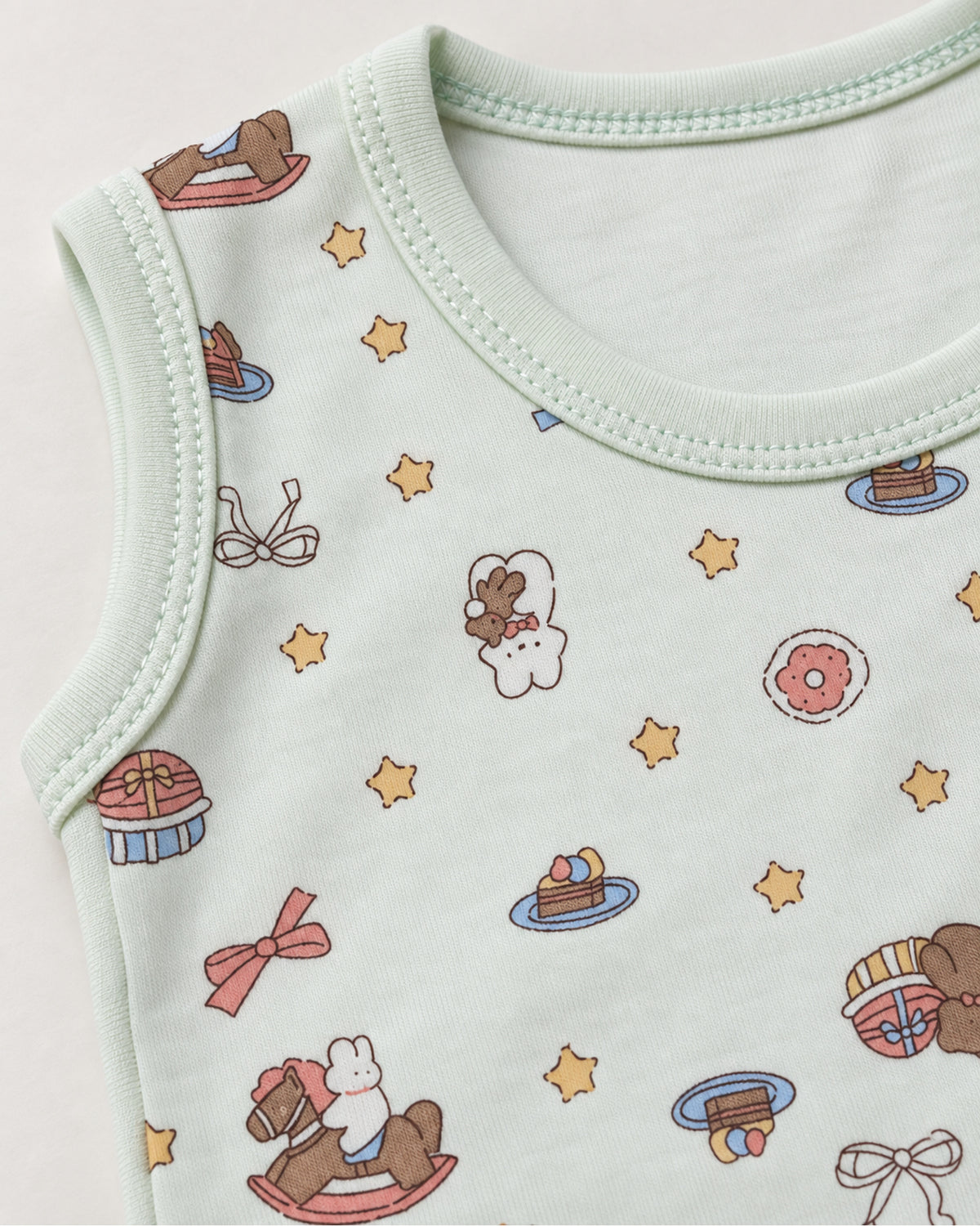 Pale mint rocking horse and teddy bodysuit neckline and armhole stitching detail