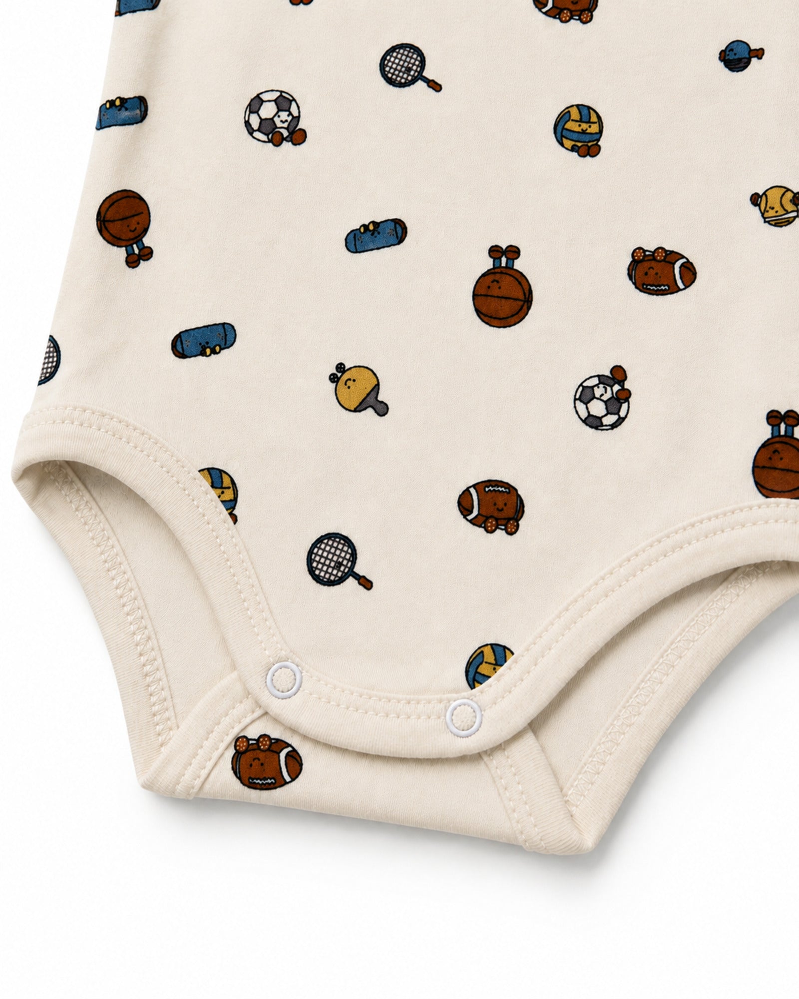 Cream baby bodysuit sports print, stitching and crotch snap detail on pure white background