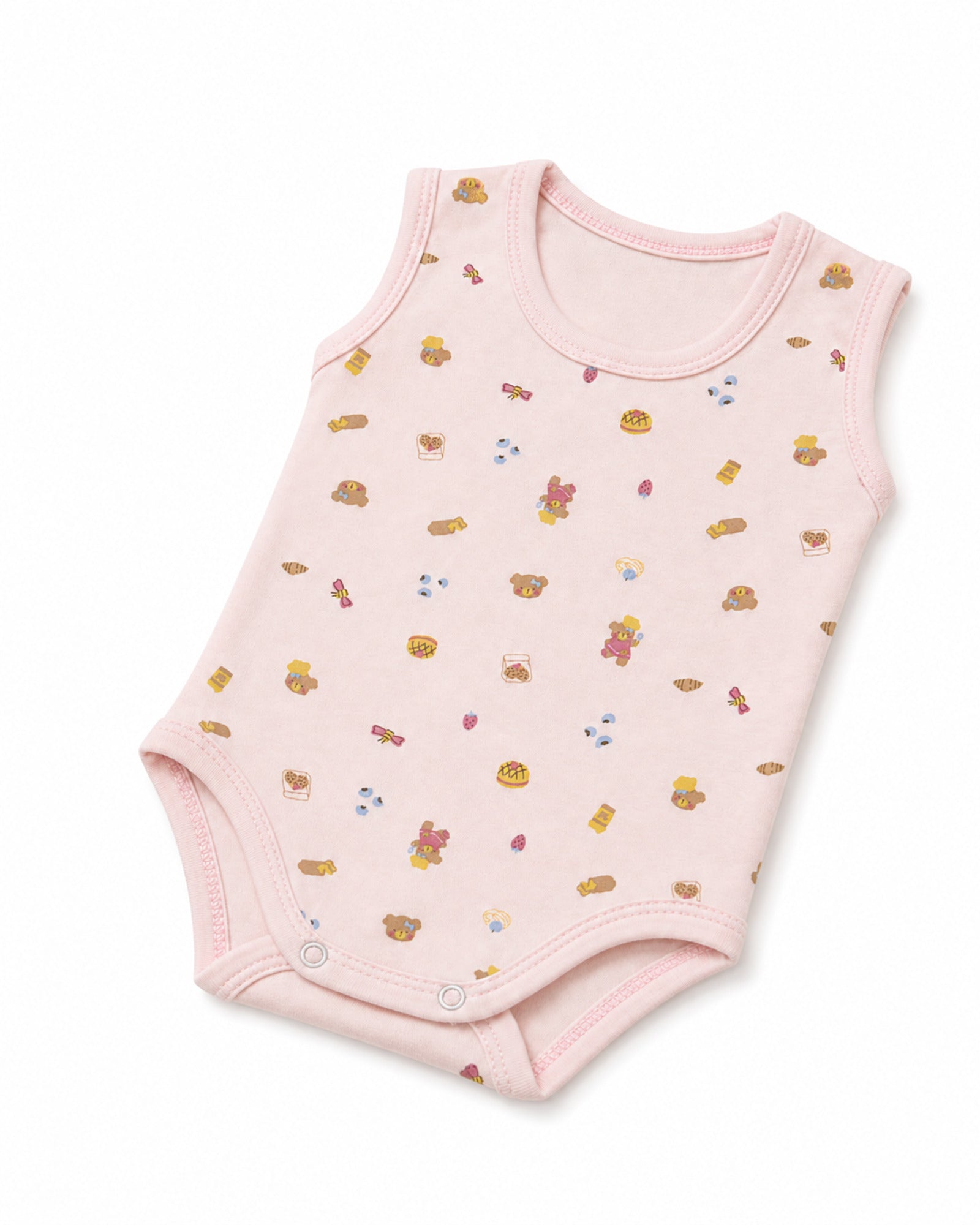 Pale pink sleeveless baby bodysuit in angled composition on pure white background