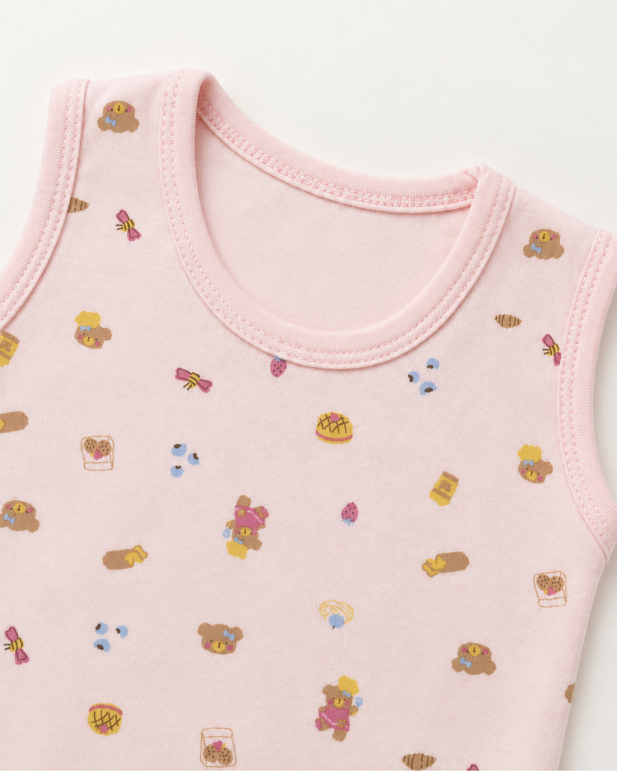 Pale rose teddy bear and treats bodysuit neckline and armhole stitching detail