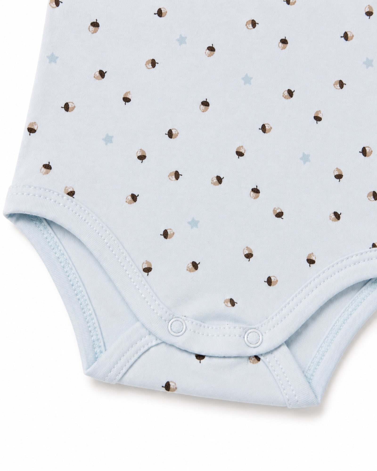 Sky blue baby bodysuit acorn and star print, stitching and crotch snap detail on pure white background