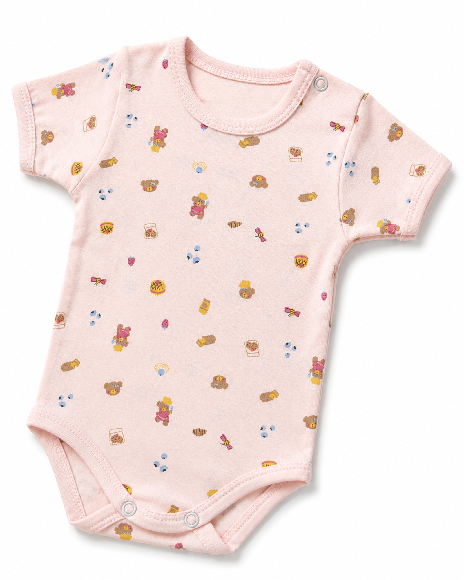 Pale pink baby bodysuit shoulder snap, print and stitching detail on white