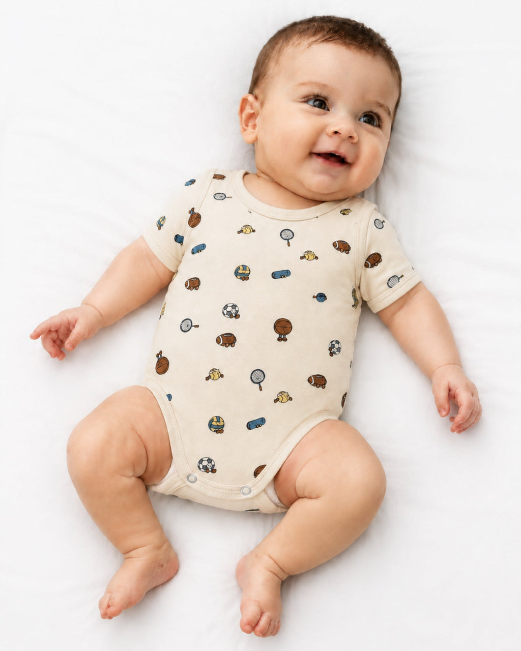 Baby wearing cream short-sleeve sports print bodysuit