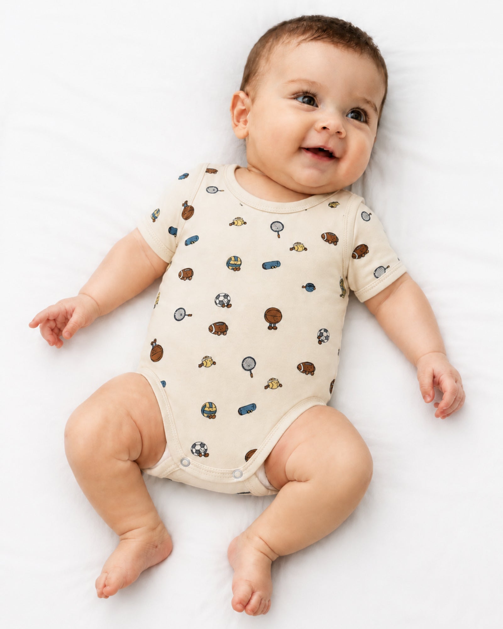 Baby wearing cream short-sleeve sports print bodysuit