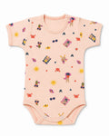 Pale peach short-sleeve baby bodysuit with playful illustrated print, front view on white