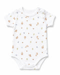 White short-sleeve baby bodysuit with squirrel, acorn and woodland-tree print, front view on white
