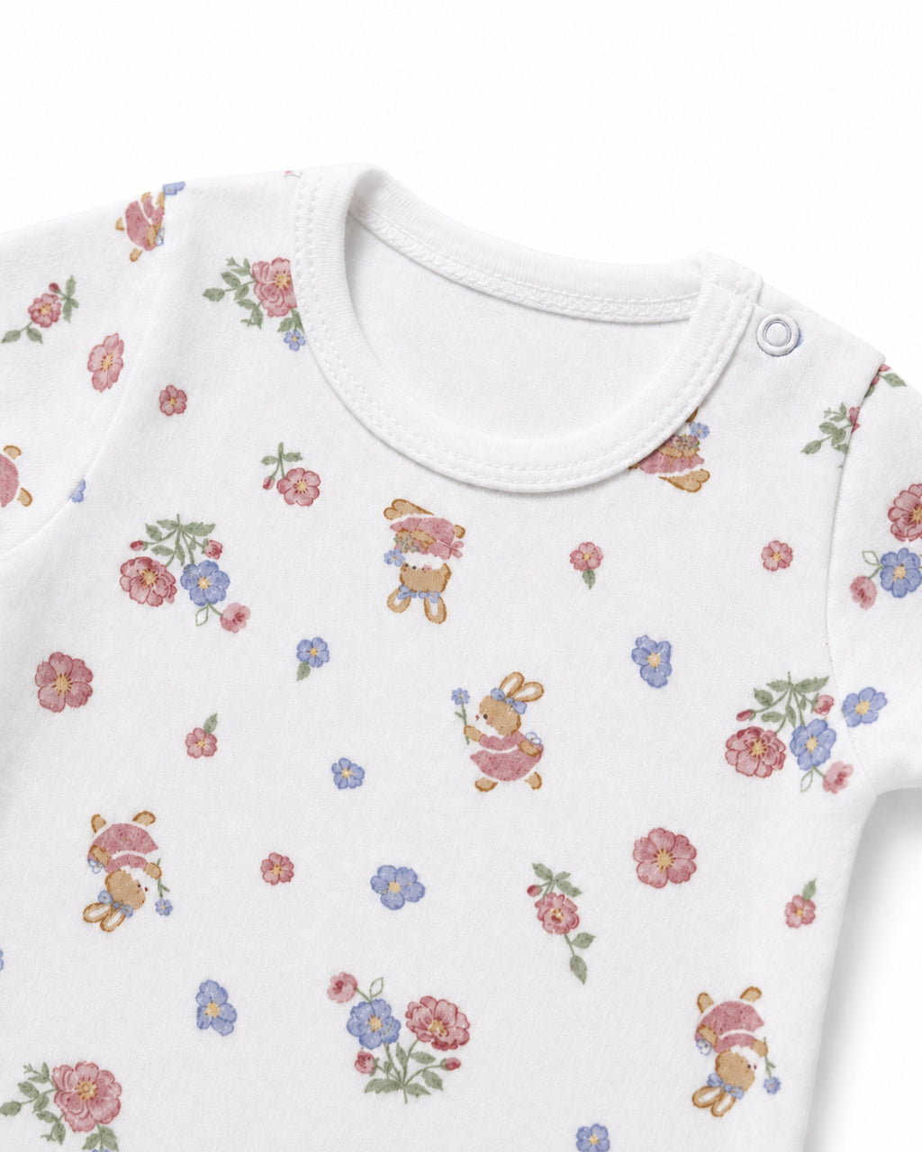 White floral bunny baby bodysuit neckline, shoulder snap and stitching detail on white