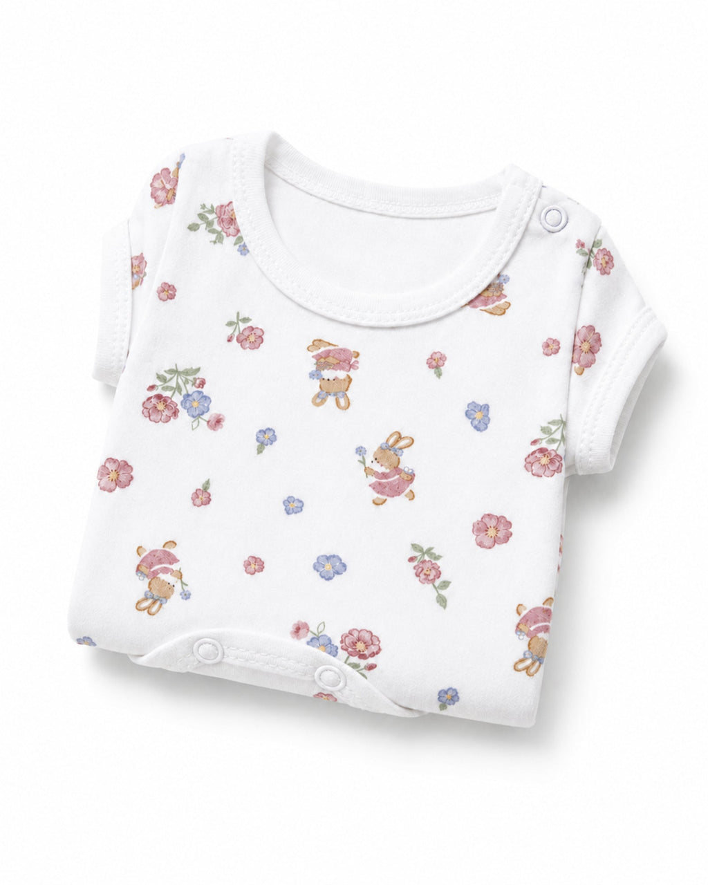 Folded white short-sleeve floral bunny baby bodysuit on white