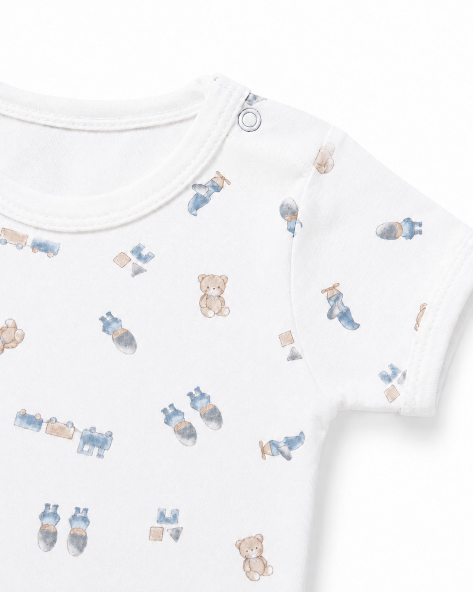 White teddy bear and toys print baby bodysuit neckline, shoulder snap and stitching detail on white