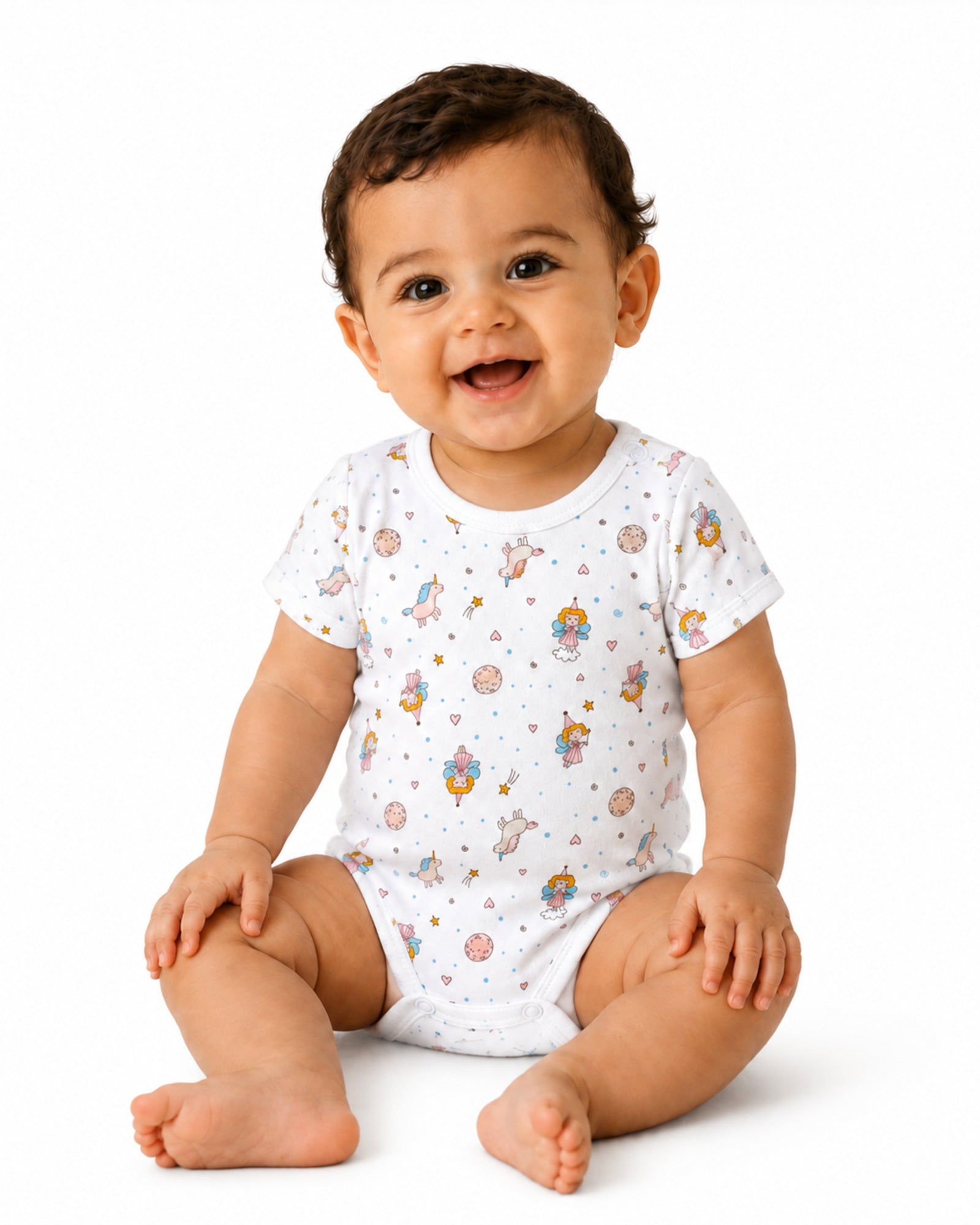 Smiling baby wearing white short-sleeve fairies and unicorns print bodysuit on white