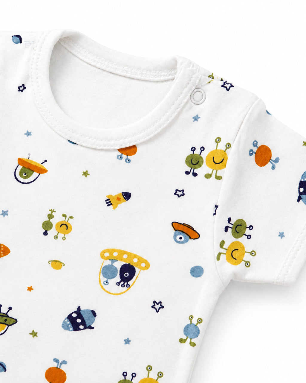 White rockets and space creatures print baby bodysuit neckline, shoulder snap and stitching detail on white