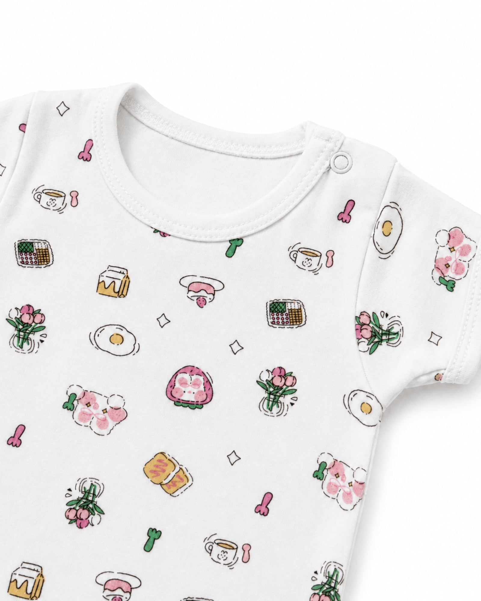 White breakfast and flowers print baby bodysuit neckline, shoulder snap and stitching detail on white
