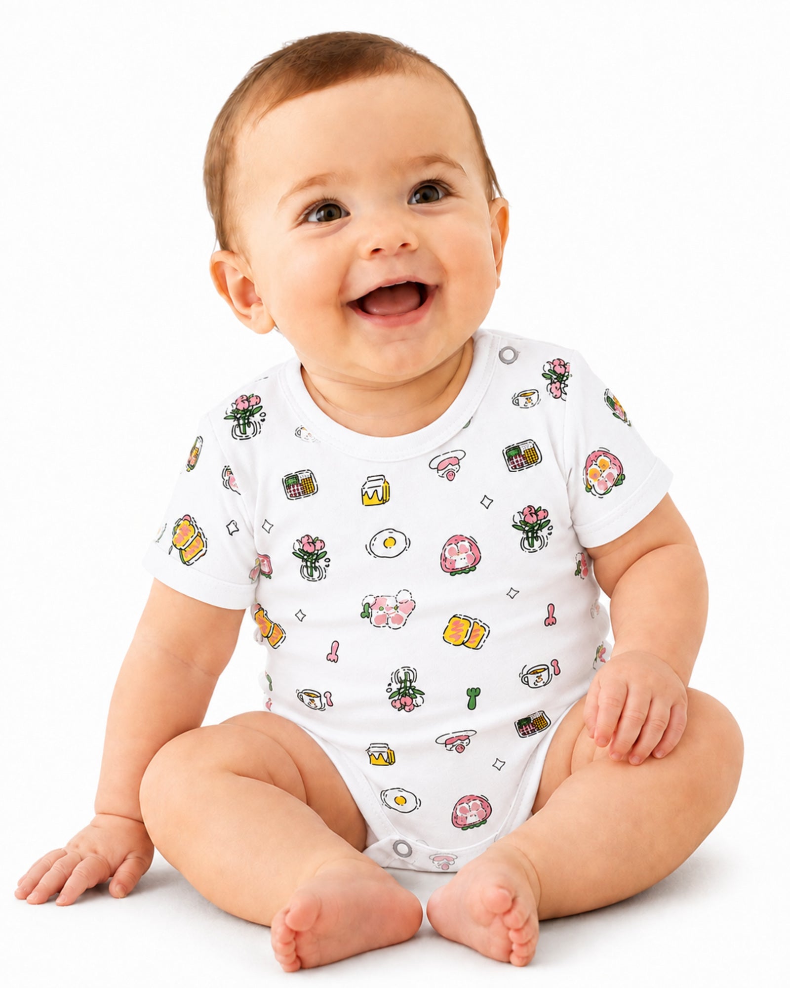 Smiling baby wearing white short-sleeve breakfast and flowers print bodysuit on white