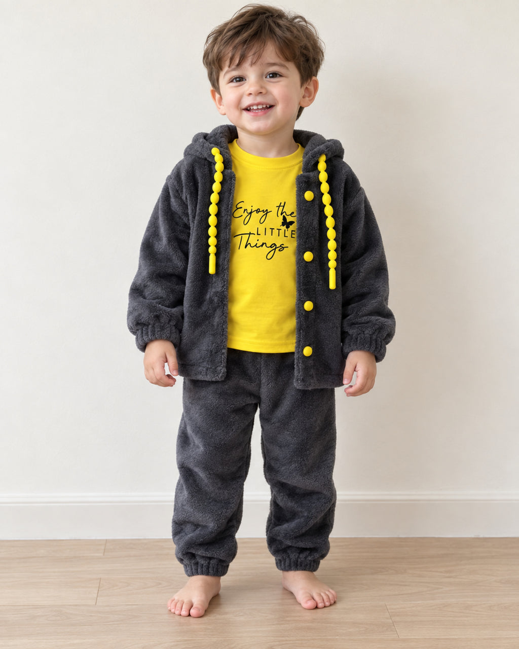 Dark grey and yellow three-piece outfit set, generated model wearing the outfit