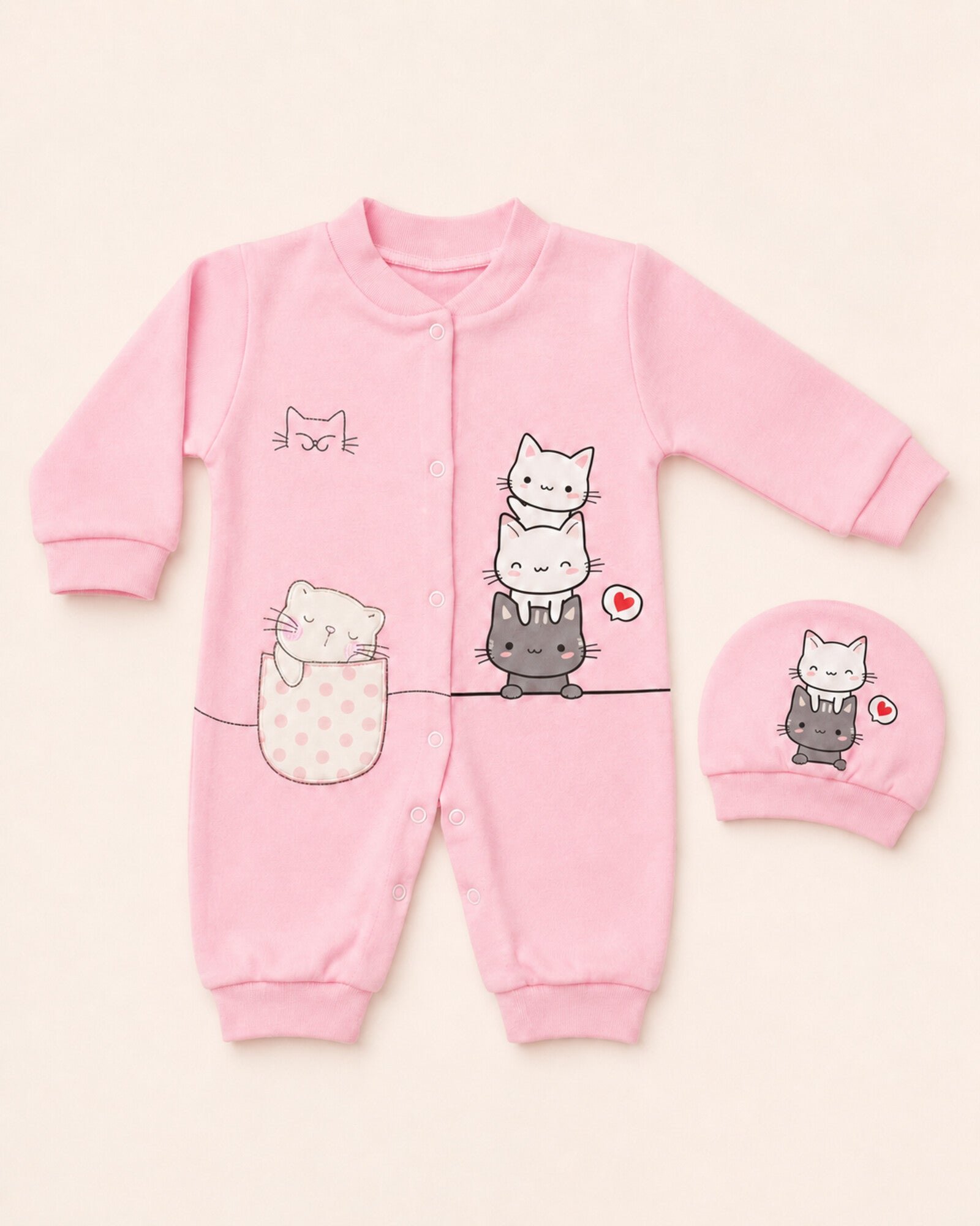 Pink cat-print baby sleepsuit and matching hat – full set view