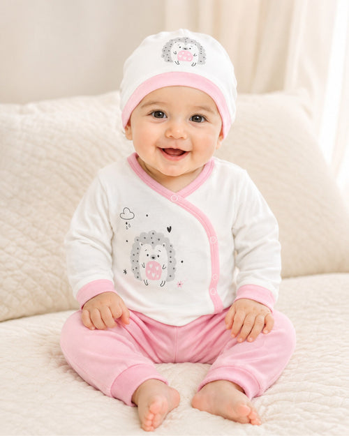 Baby wearing pink three-piece hedgehog wrap-top set