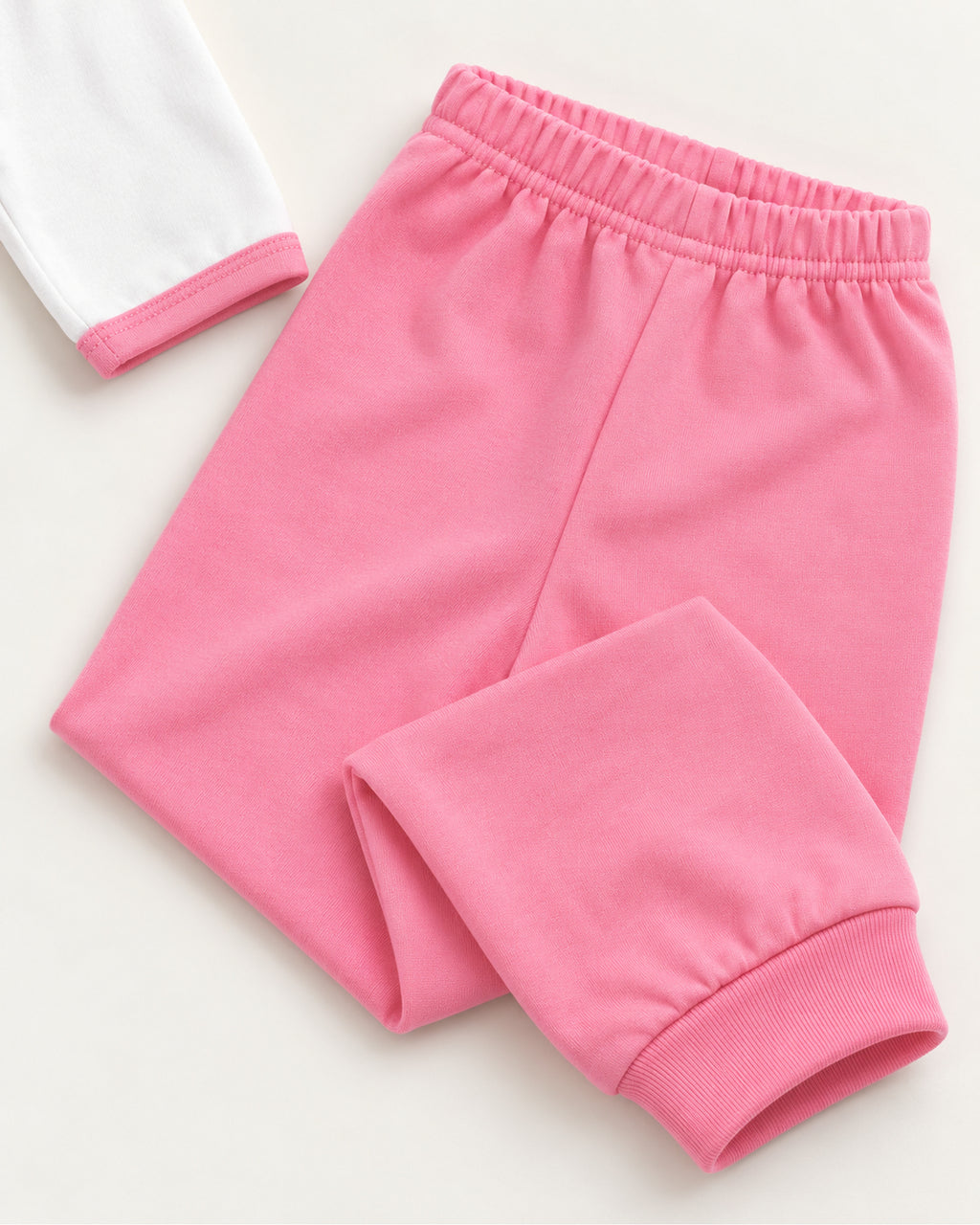 Pink hedgehog baby set trousers, elastic waistband and ankle cuff detail