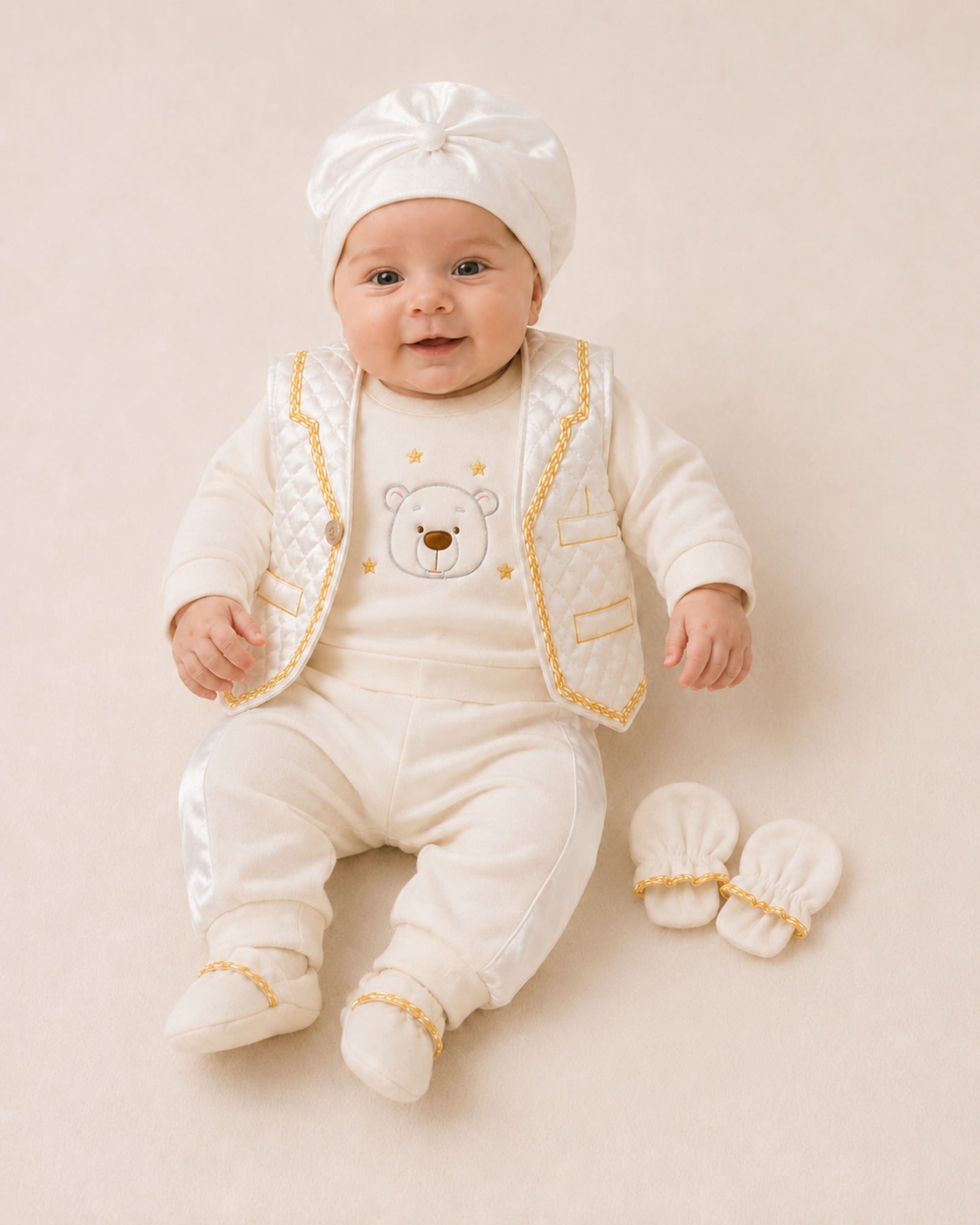 Baby wearing cream ceremony set with bear waistcoat