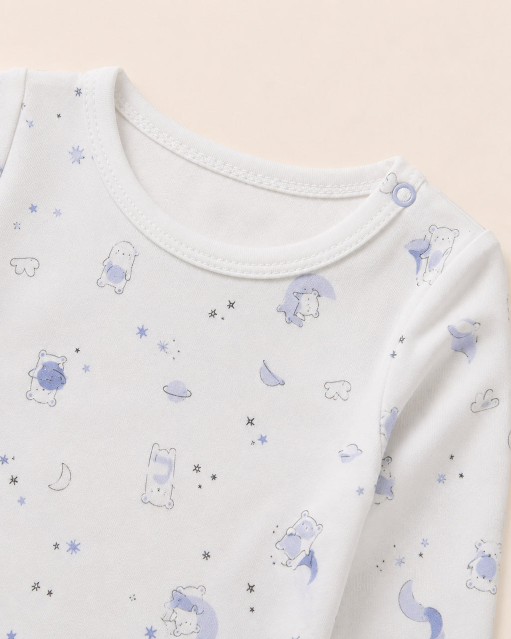 White baby two-piece set – neckline, shoulder snap and teddy bear space-print detail