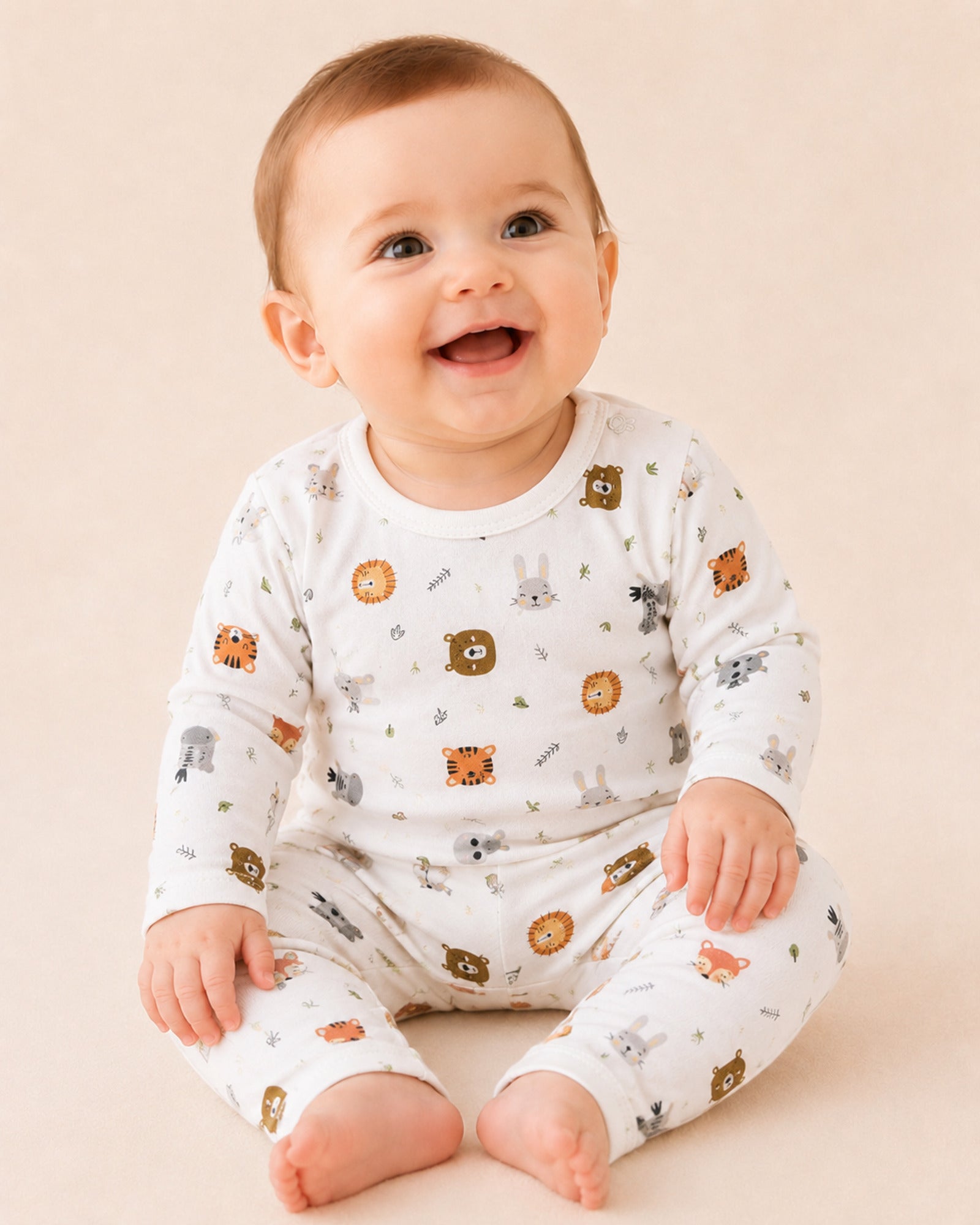 Baby wearing white wild-animal print two-piece set