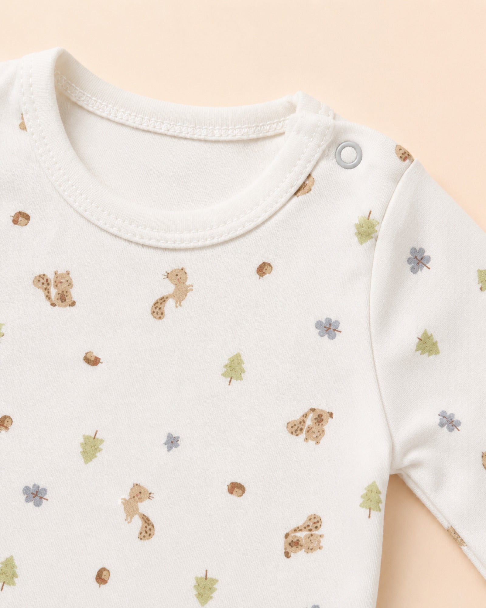 Single shoulder snap and squirrel woodland print detail