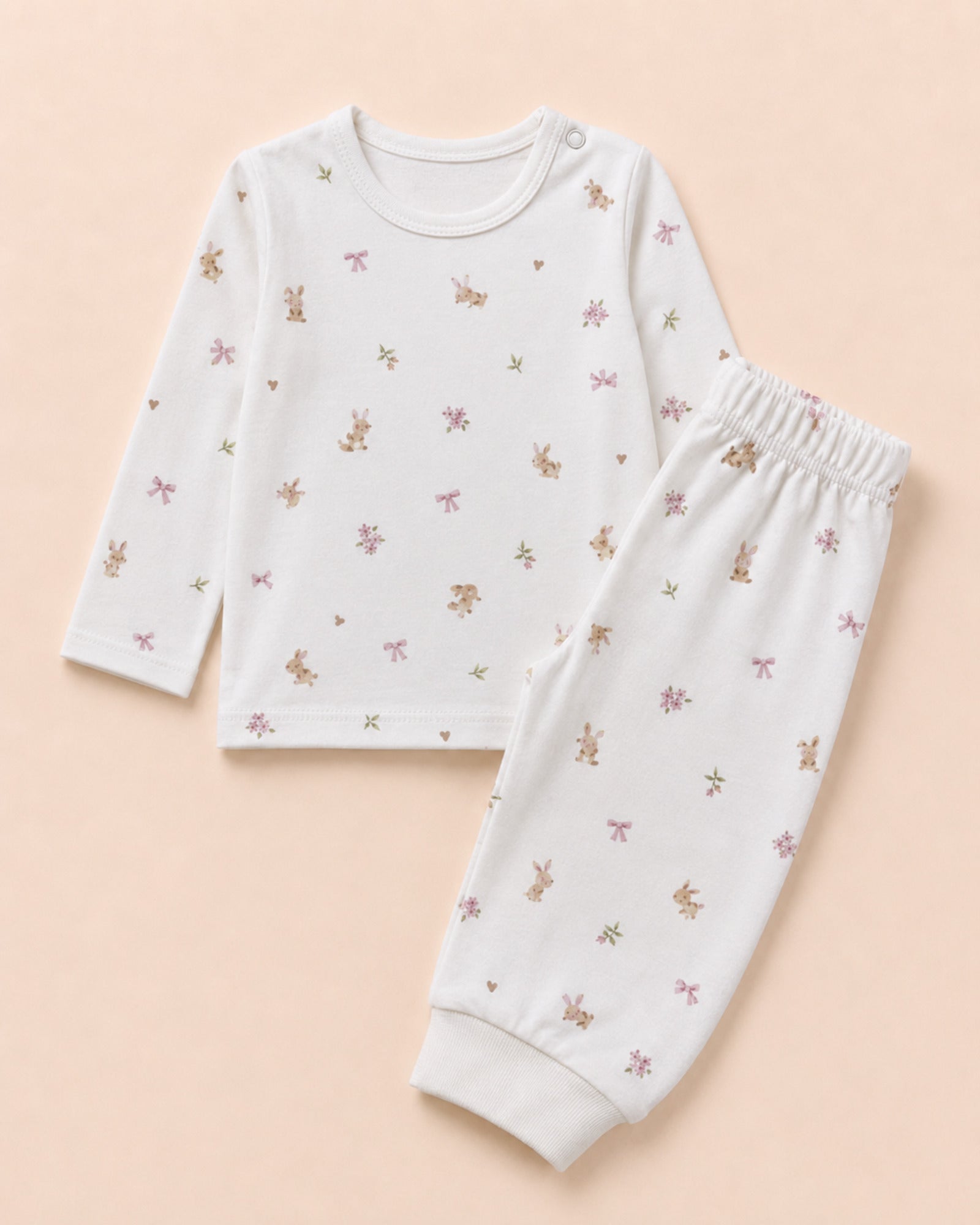 White bunny-print baby two-piece set – folded composition