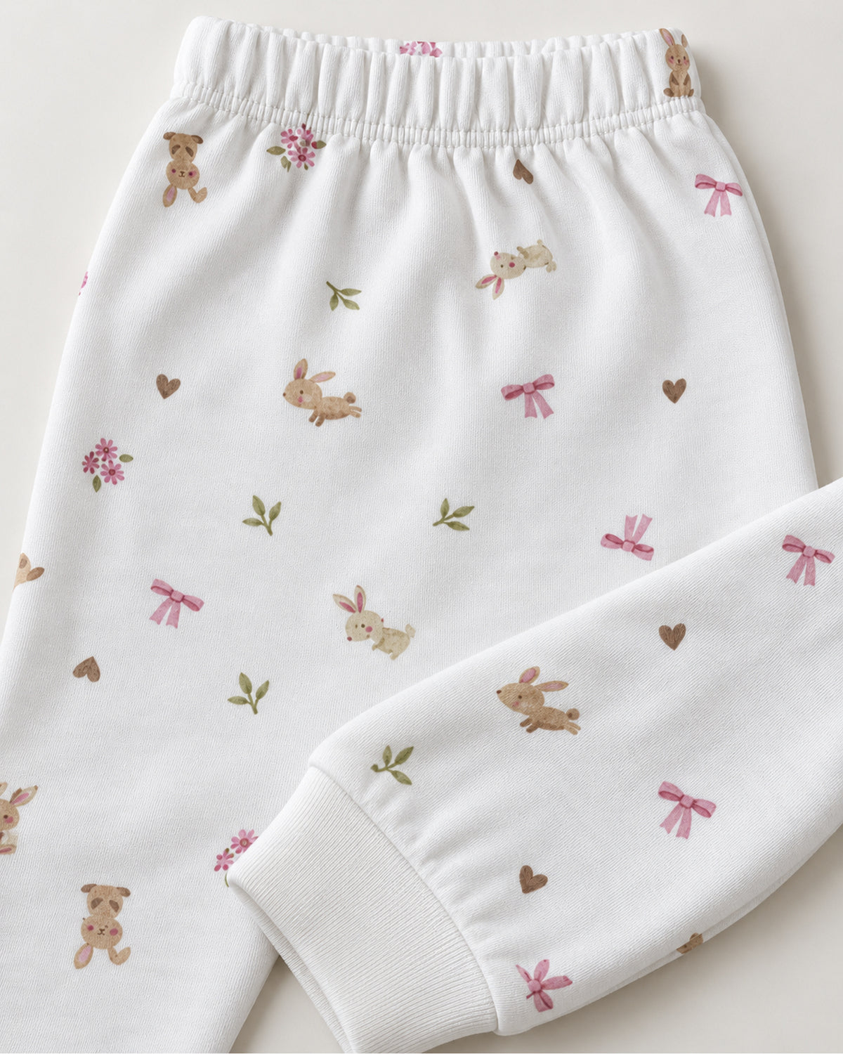White bunny bow and flower print trousers elastic waistband and ankle cuff detail