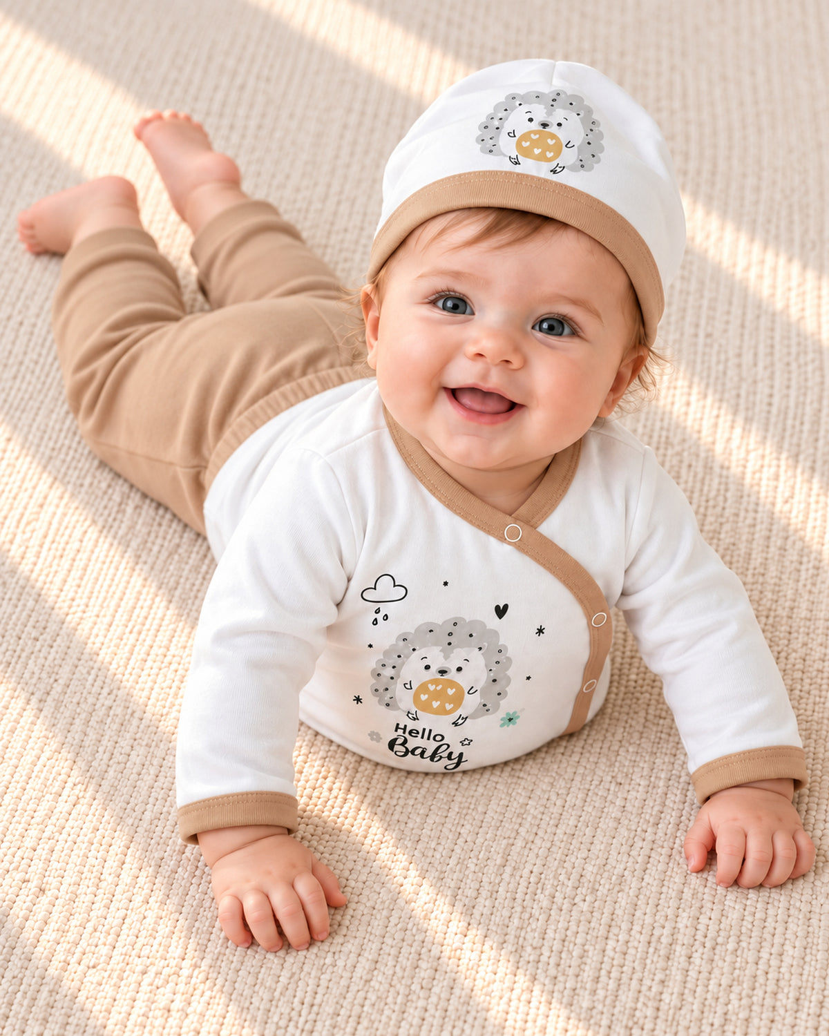 Baby Dream coffee hedgehog baby set, baby wearing the set during awake floor play