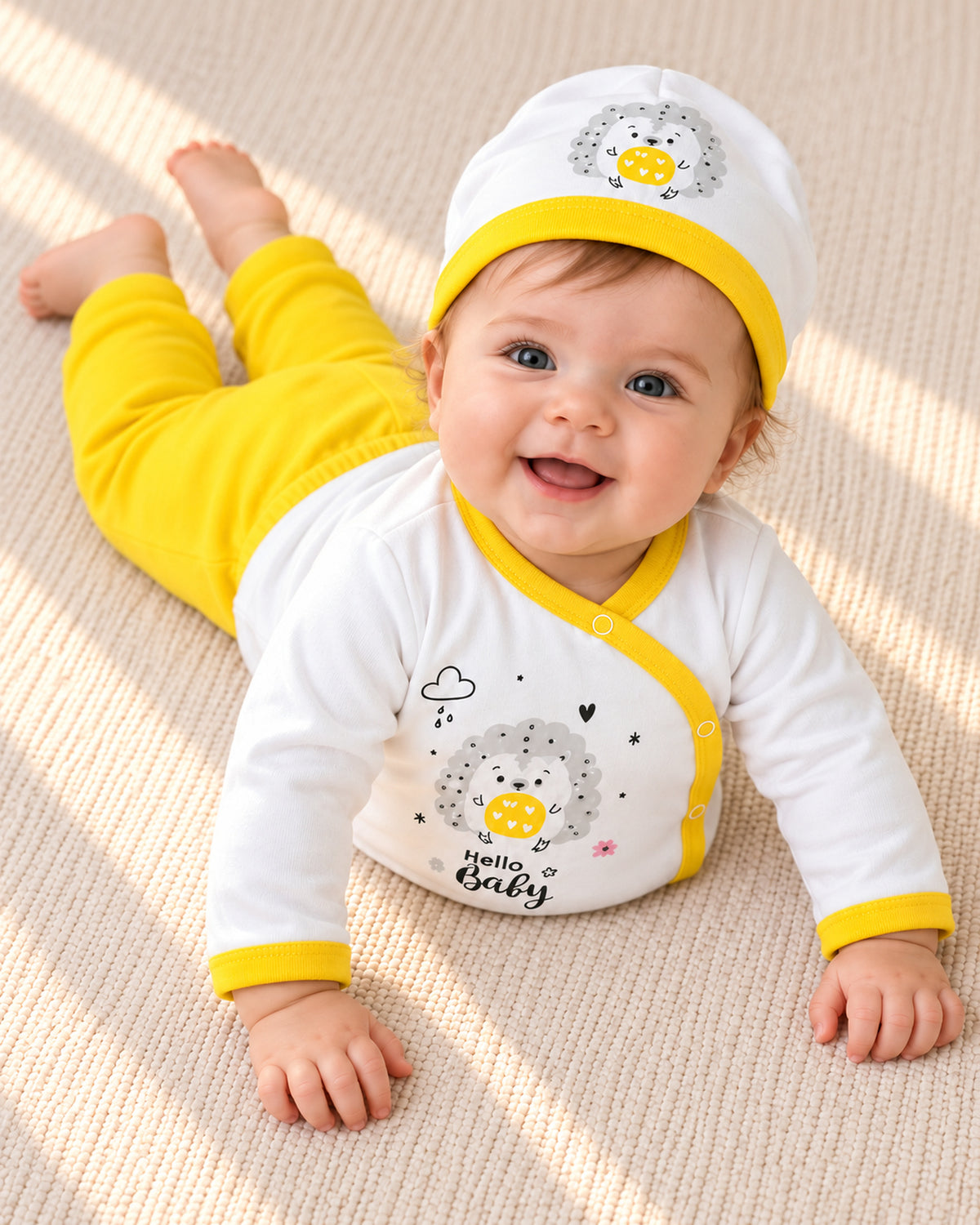 Baby Dream yellow hedgehog baby set, baby wearing the set during awake floor play