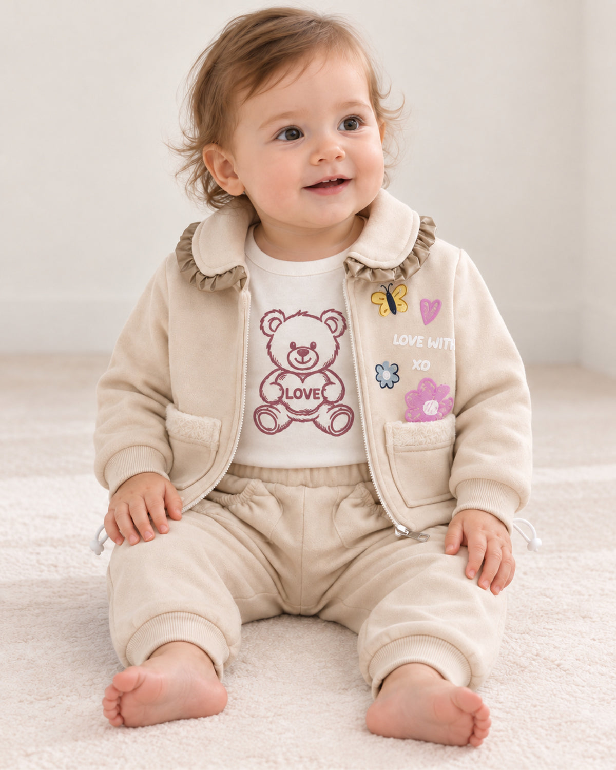 Cream beige baby girl three-piece set, baby wearing the jacket and joggers with a teddy bear LOVE top
