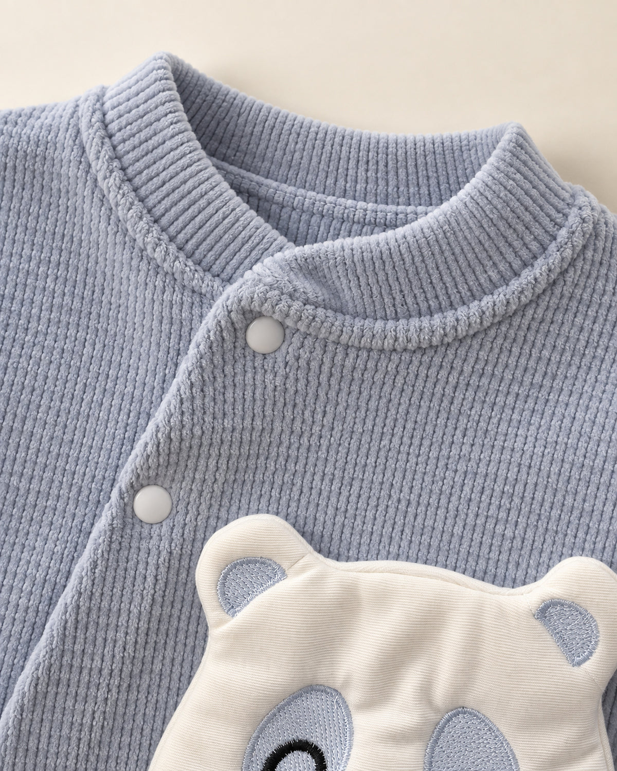 Baby Blue baby bear set, neckline and fastening detail