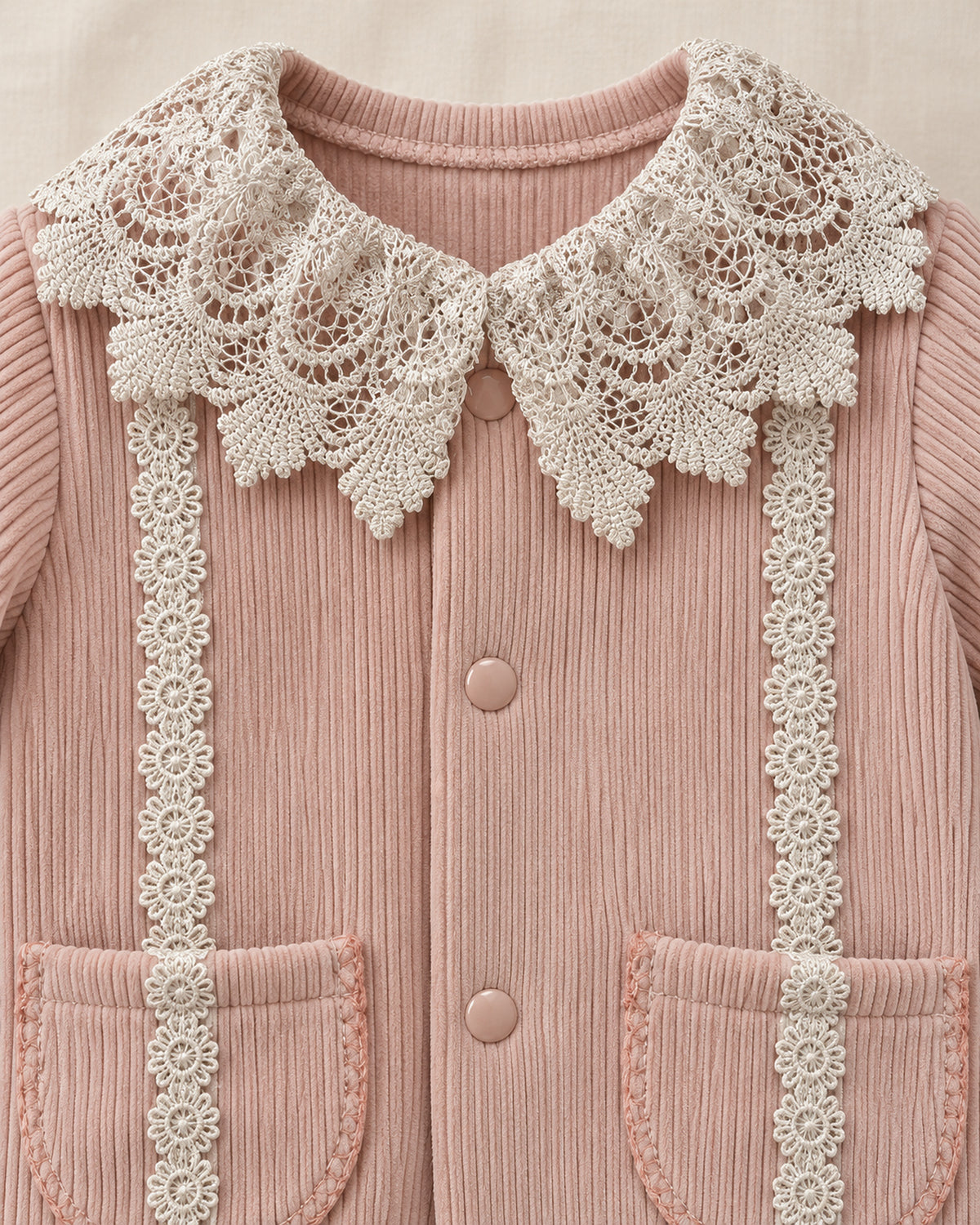 Dusty Rose baby lace collar sleepsuit, collar and bow detail