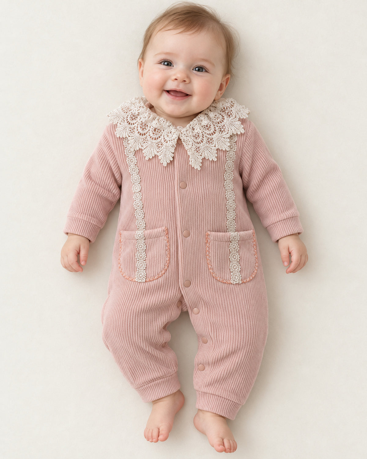 Dusty Rose baby lace collar sleepsuit, sleepsuit worn by an infant